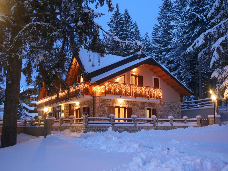 La Pinetina Residence exterior in the snow
